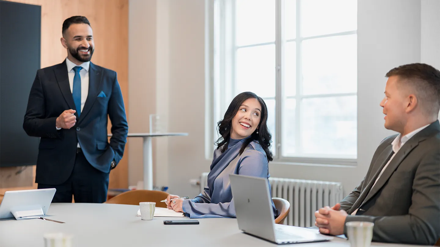 Happy people in business meeting